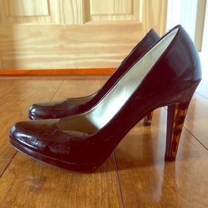 Black patent leather pumps